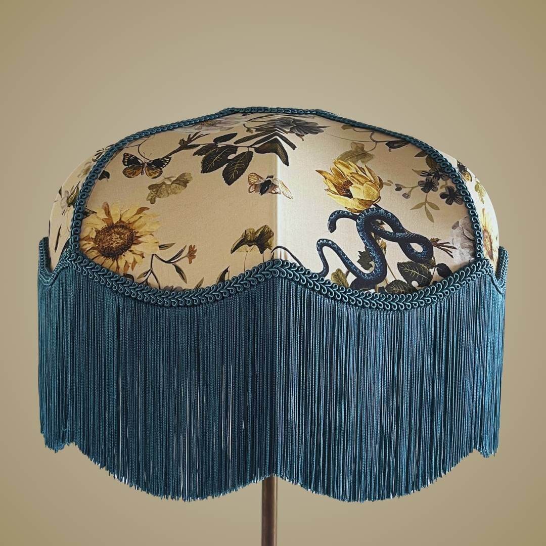 Art Deco style lampshade with pretty florals entertwined with snakes and a long blue fringe