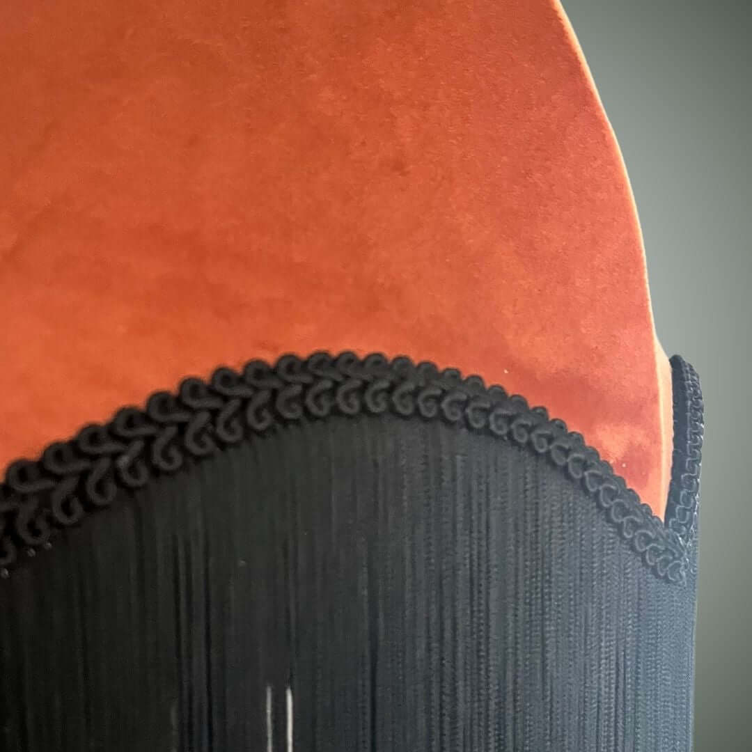 Burnt orange velvet dome parachute lampshade showing braid and fring