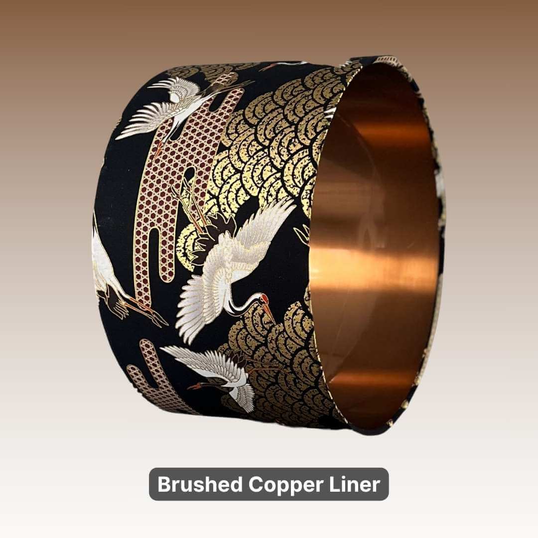 Japanese cranes drum lampshade with a brushed detail of brushed copper interior liner