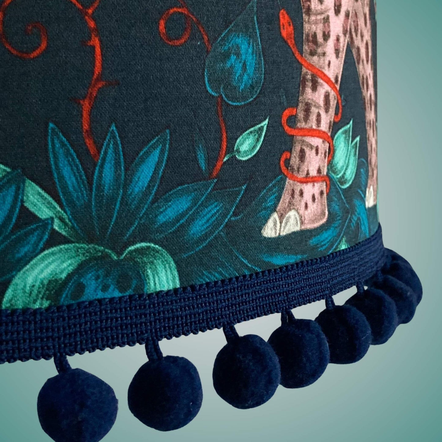 Emma J Shipley zambezi elephants Lampshade close up of navy pom pom trim