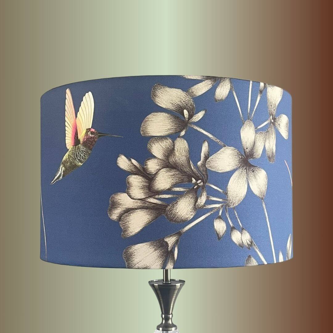 Indigo Blue Lampshade with Florals & Hummingbirds fabric by Harlequin Amazillia on lampstand
