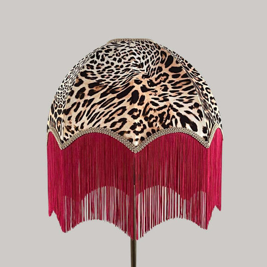 Leopard print dome lampshade with a hot pink fringe