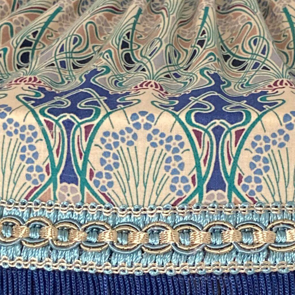Tiffany lampshade with Liberty Ianthe art deco fabric and deep navy fringe tassels and braid with metalic gold  and pleating