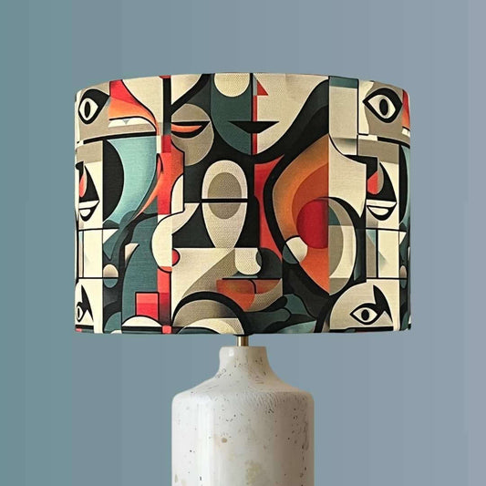 Picasso style faces lampshade on marble base