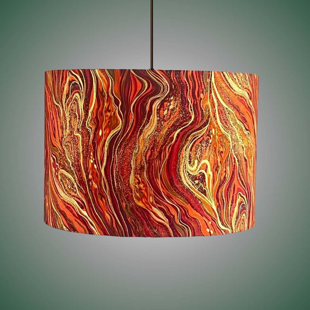 liquid marle effect drum lampshade orange red & gold swirls hnagoing on a pendant