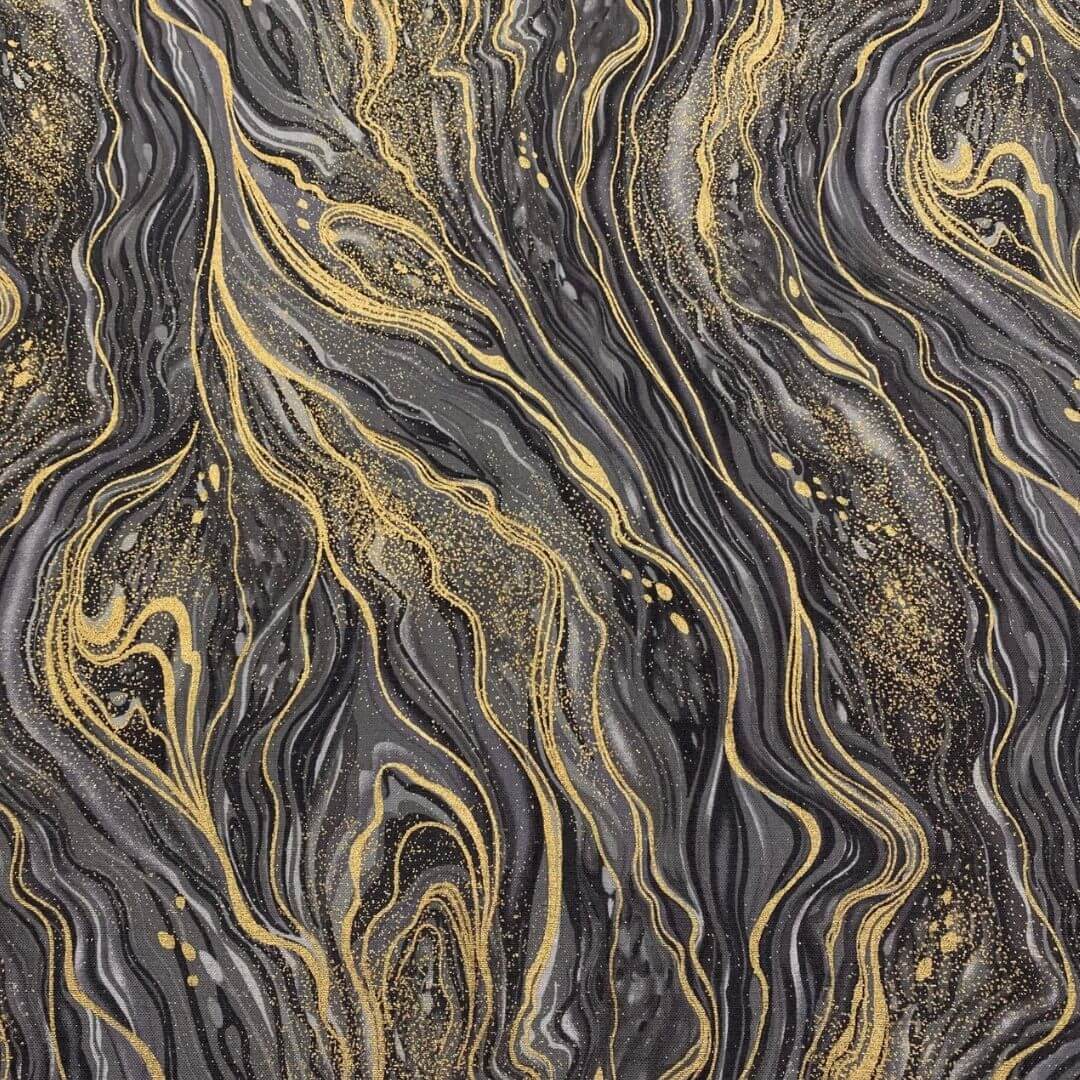marbled fabric pattern in shades of grey, silver and gold with flowing lava veins and scattered metallic gold glitter.