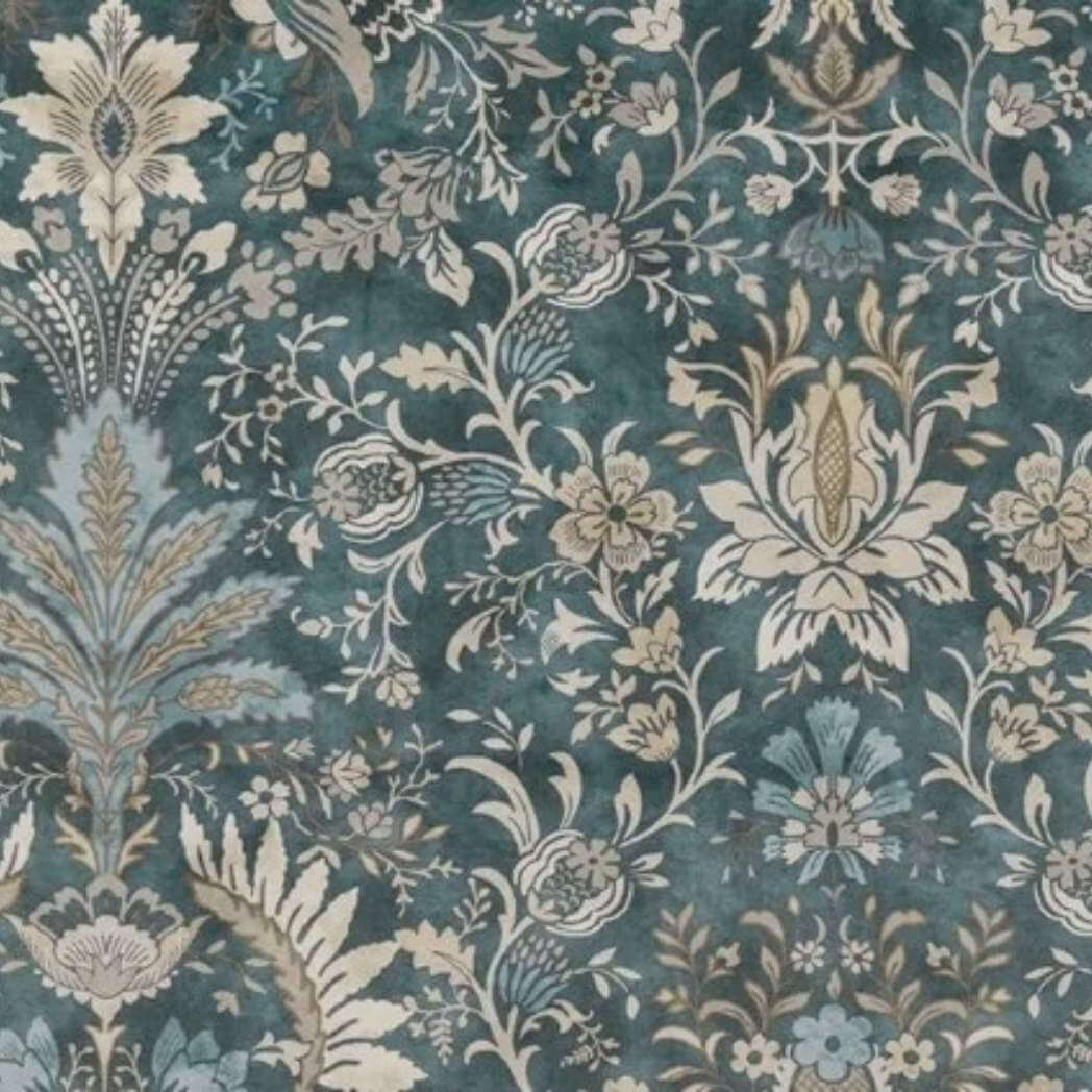 Floral and leaf patterned velvet fabric in blue and beige tones.