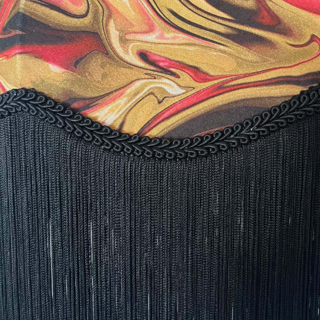 Raspberry Pink & dirty lime marble art deo style lampshade showing close up of fringe.