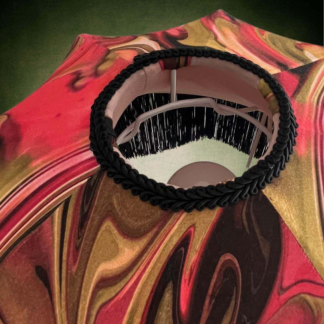 Raspberry Pink & dirty lime marble art deo style lampshade with black fringe. Top view showing braid