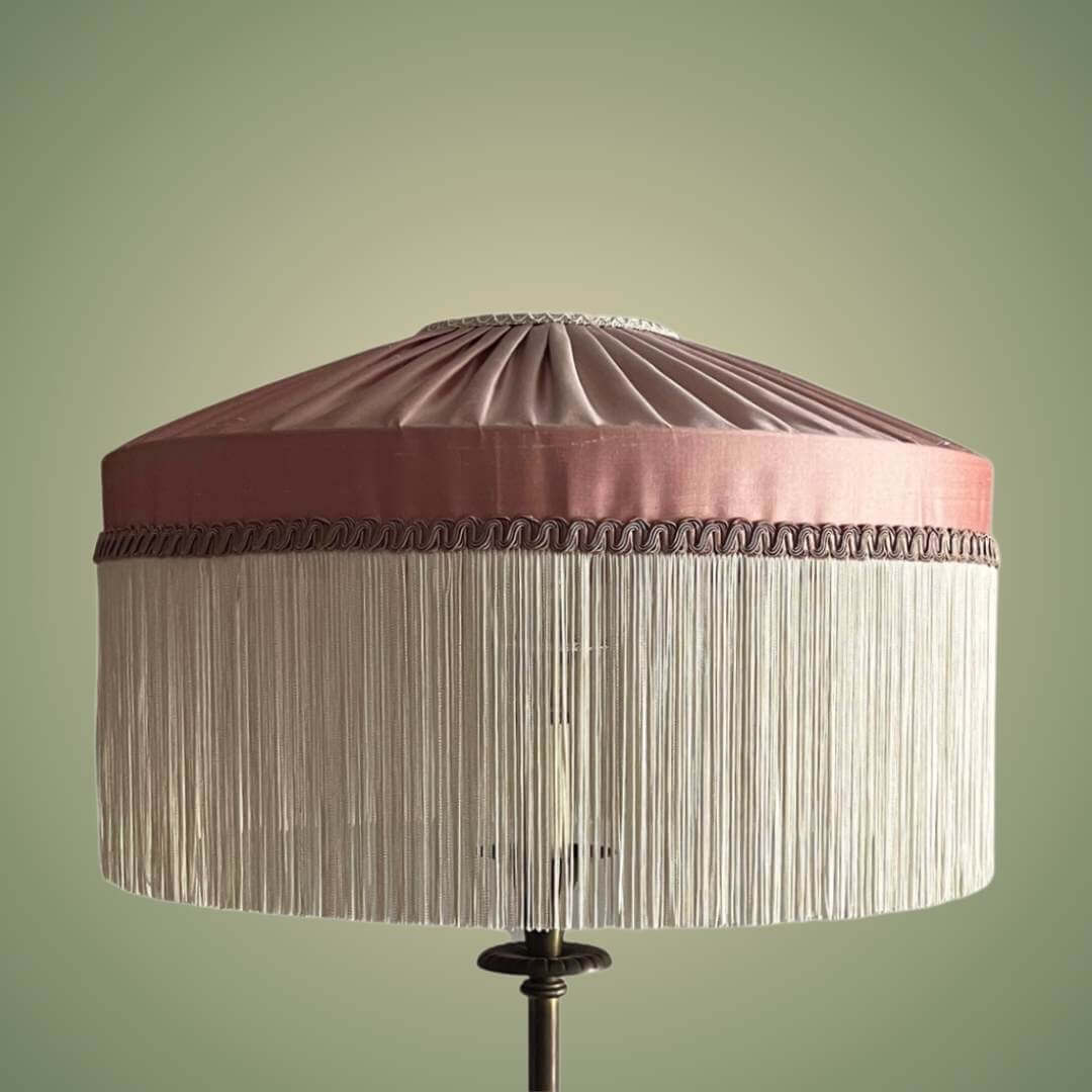 Pink silk tiffany style lampshade with ivory fringe
