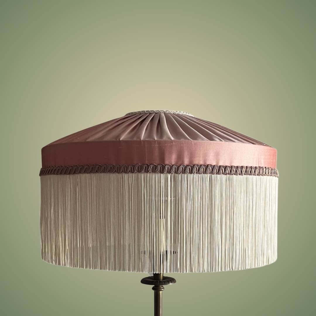 Pink silk tiffany style lampshade with ivory fringe