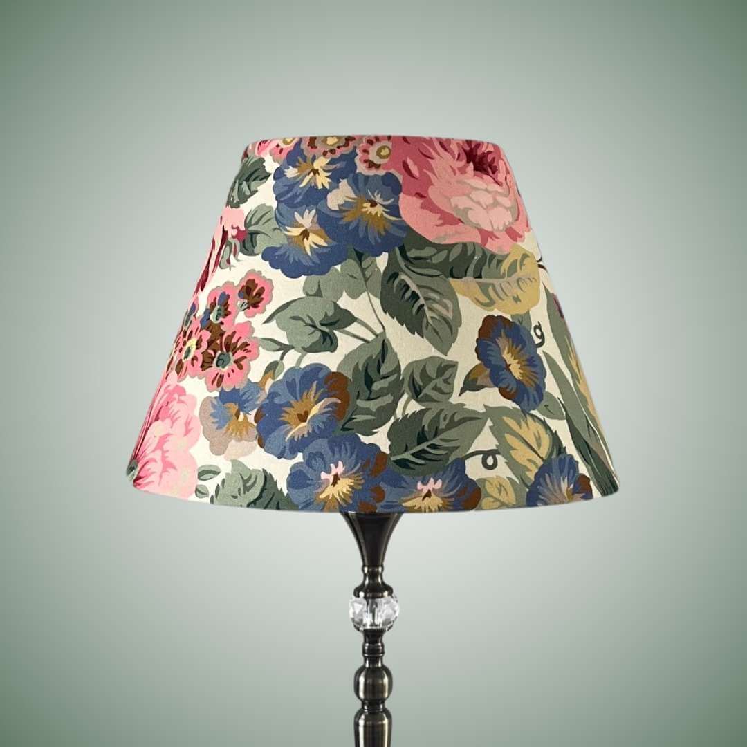 Rose and Peony empire conical floral lampshade shown on a lampbase