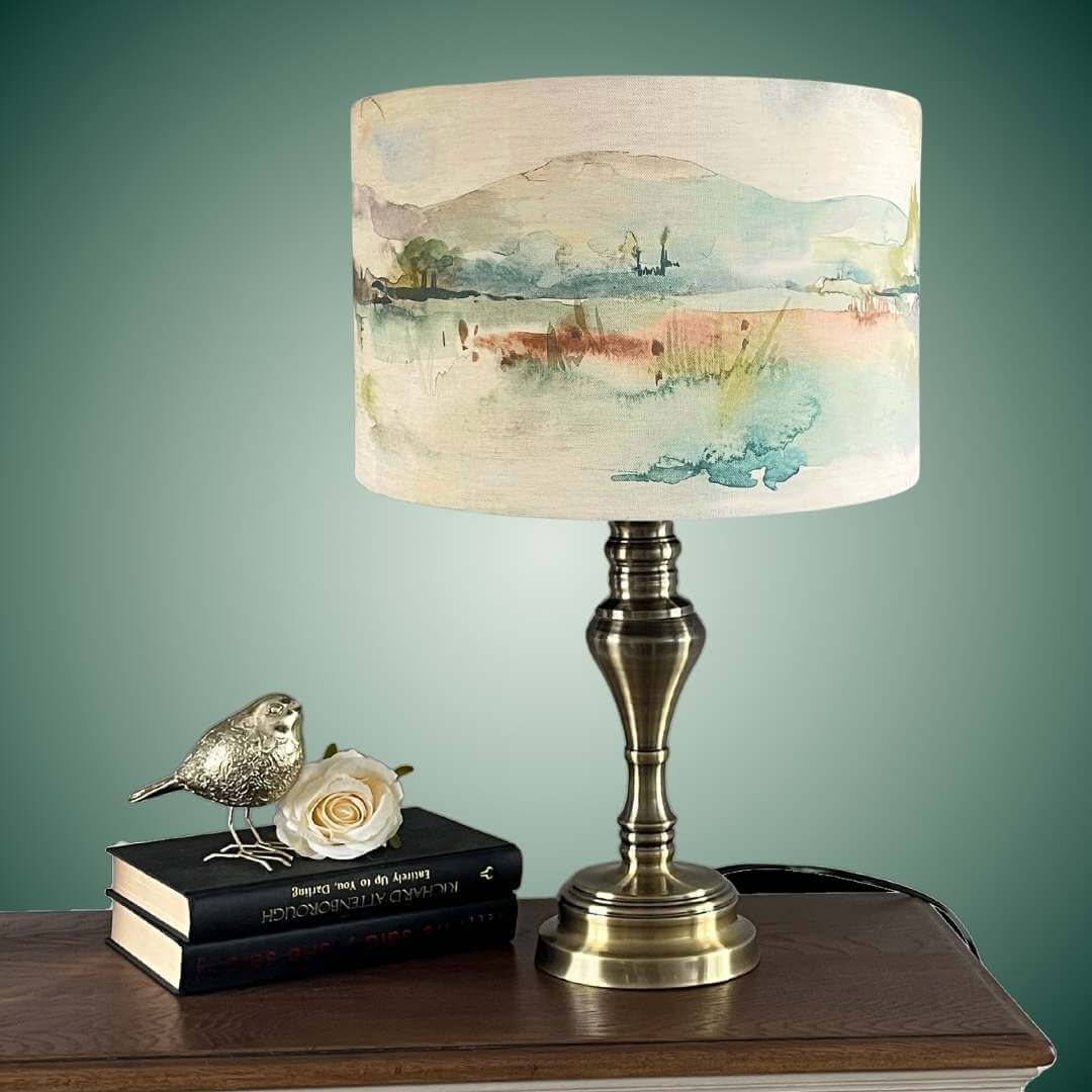 Voyage Maison Russet Shores Drum lampshade on a table lamp in a lifestyle setting