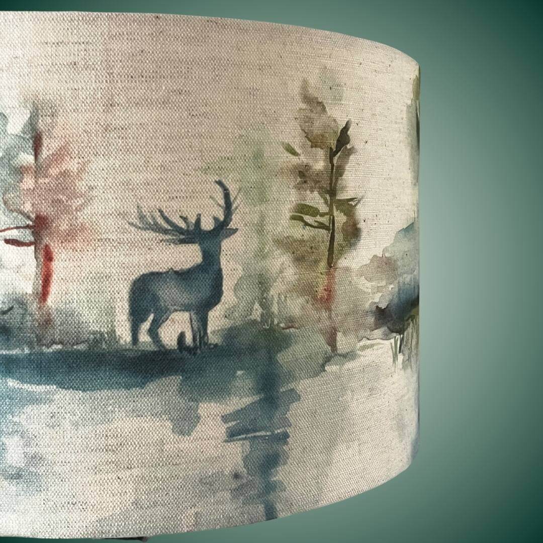detail of Drum lampshade with highland forest scene & stags