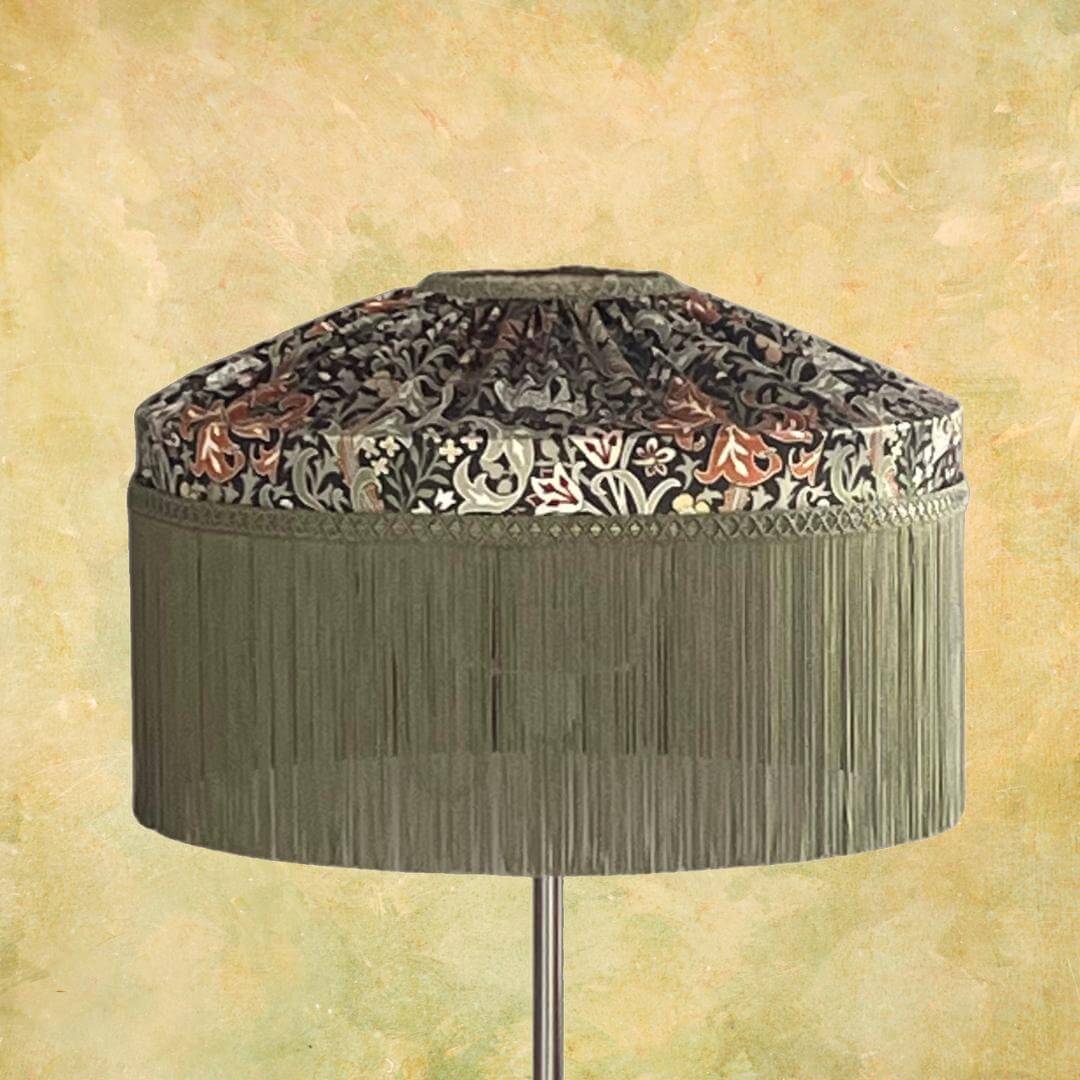 William Morris Golden Lily Satin Tiffany style lampshade with sage fringe on lamp base