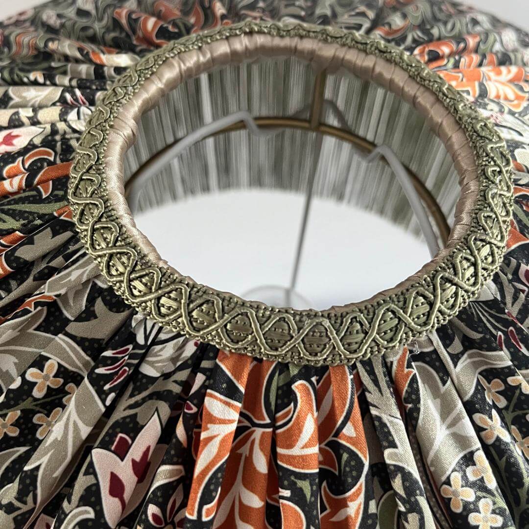 William Morris Golden Lily Satin Tiffany style lampshade with sage fringe showing top with braid