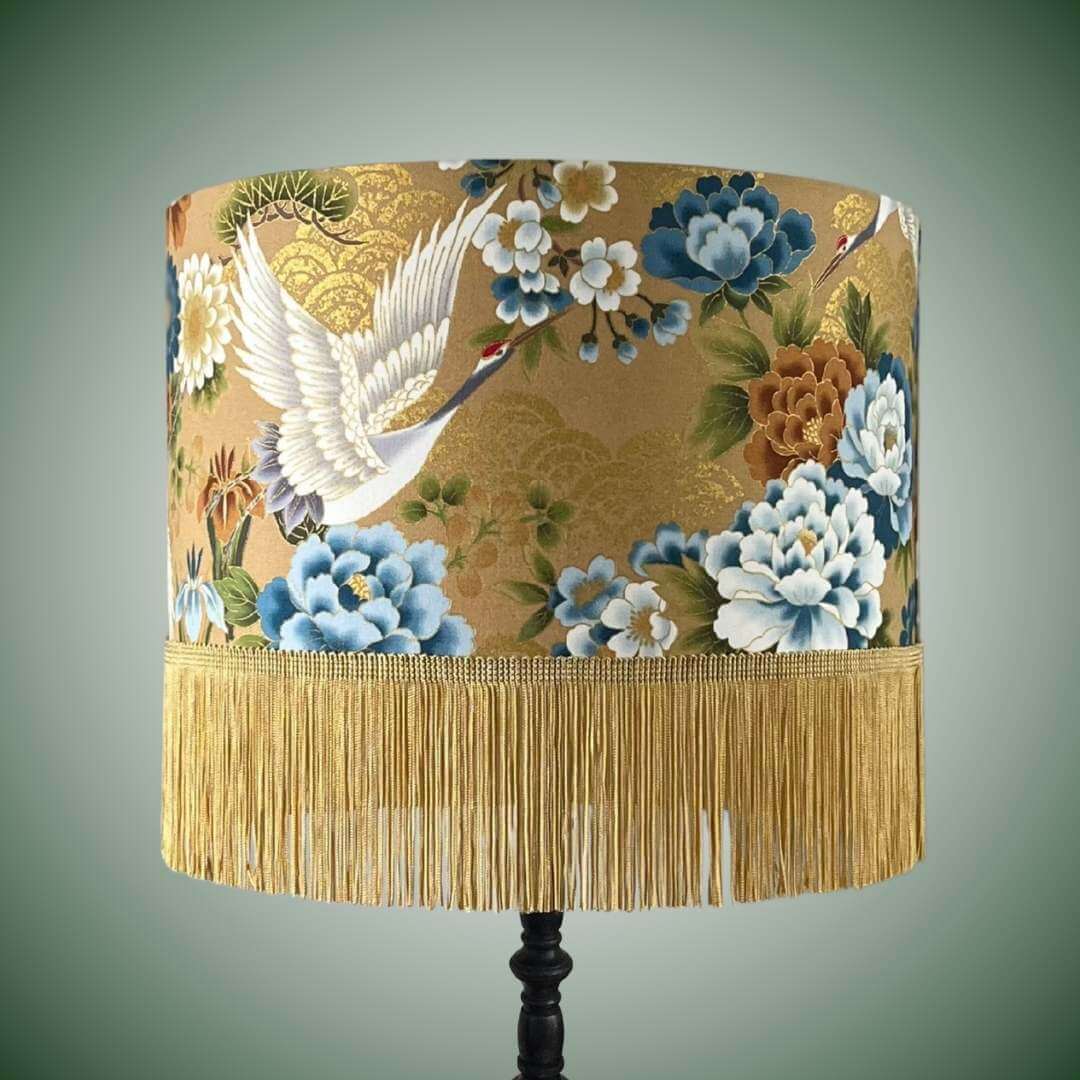 Japanese cranes and blue florals lampshade with fringe on black lamp base
