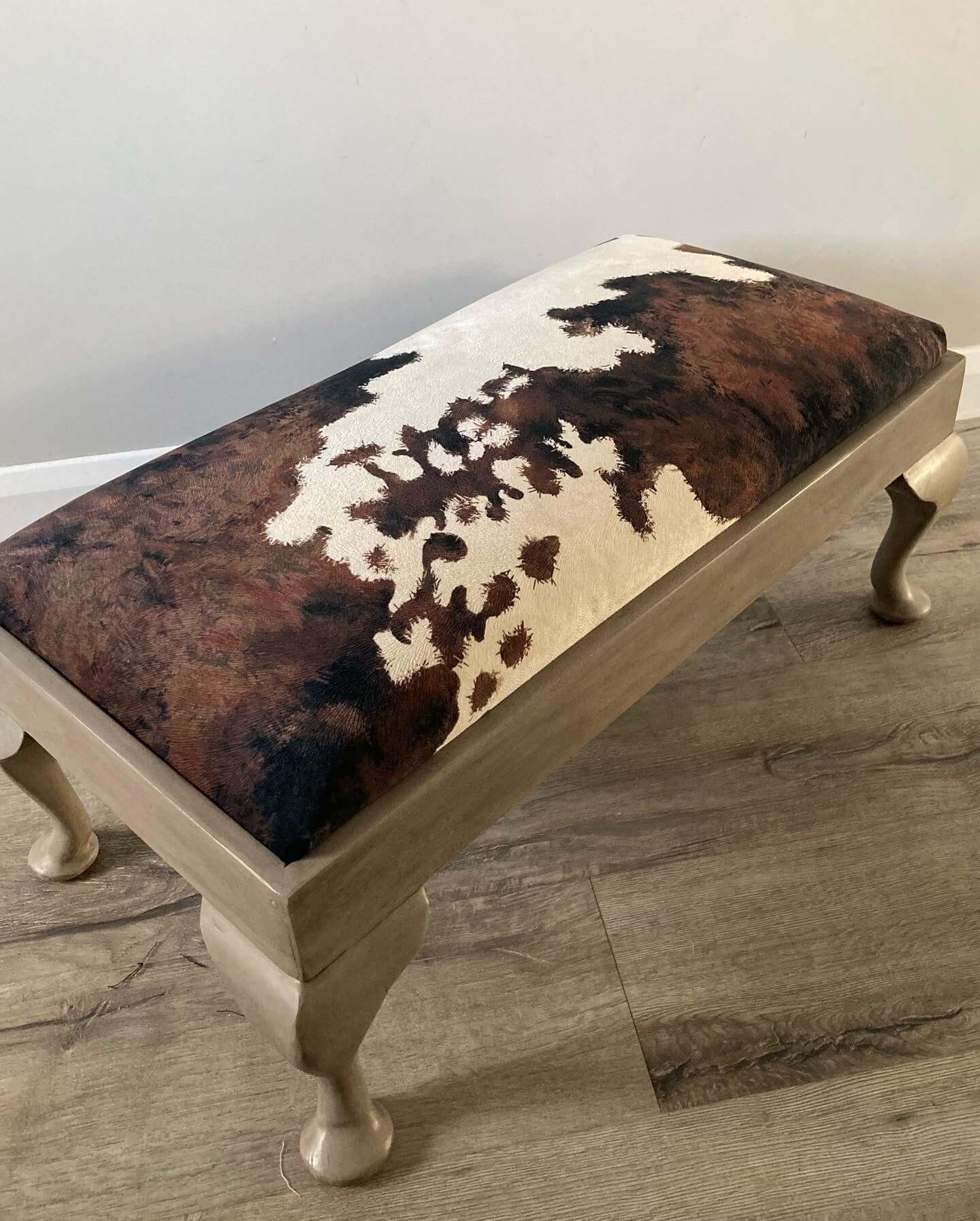 velvet cowprint footstool