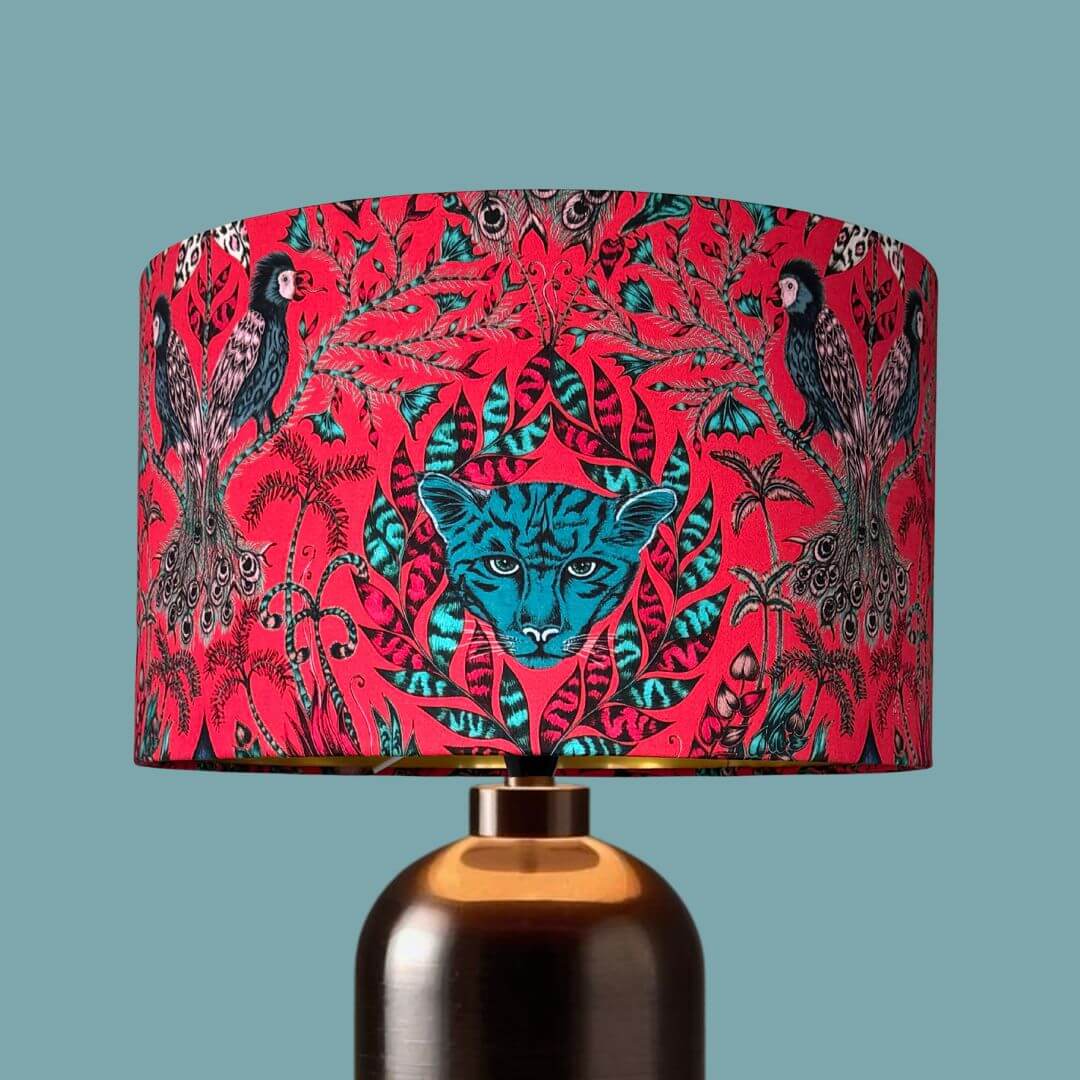 Emma Shipley Amazon Red & Teal Lampshade on a copper lampbase