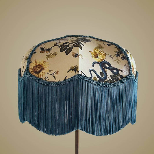 Art Deco style lampshade with pretty florals entertwined with snakes and a long blue fringe