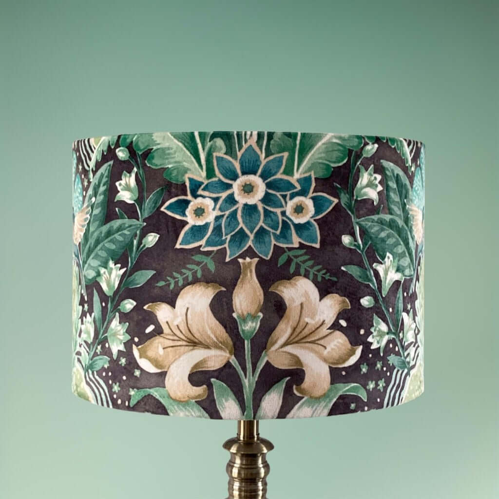 Drum lampshade with bold green floral pattern in a william morris style