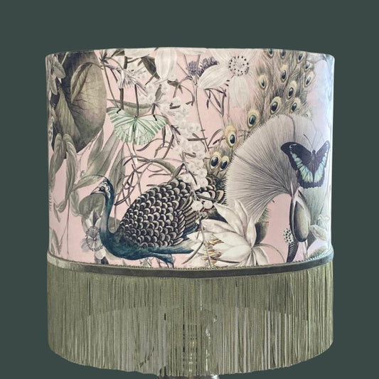 Drum lampshade in soft pink and olive green velvet with peacocks, butterflies and florals and green fringe