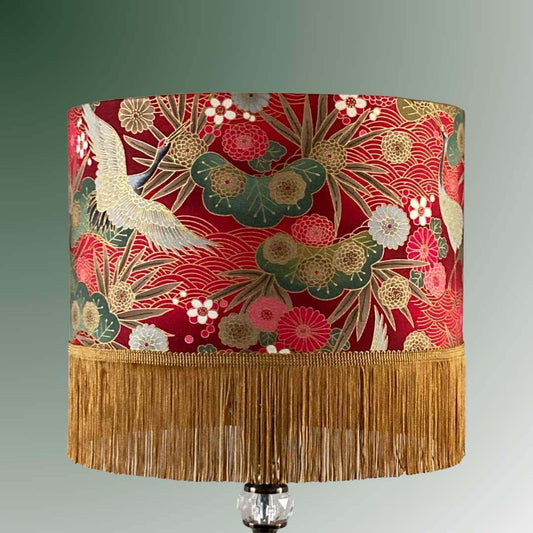Drum Lampshade made with Authentic Japanese fabric with cranes, florals, metallic gold accents and gold fringe on lampstand