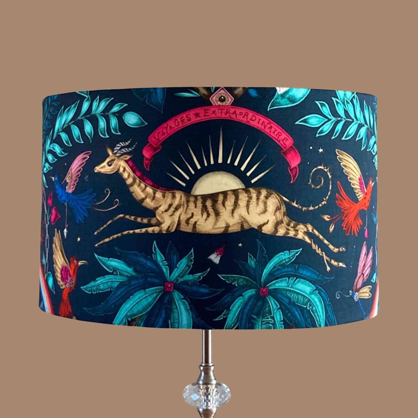 Emma J Shipley zambezi  Drum Lampshade with leaping Gazelle and birds on a floral navy blue background 