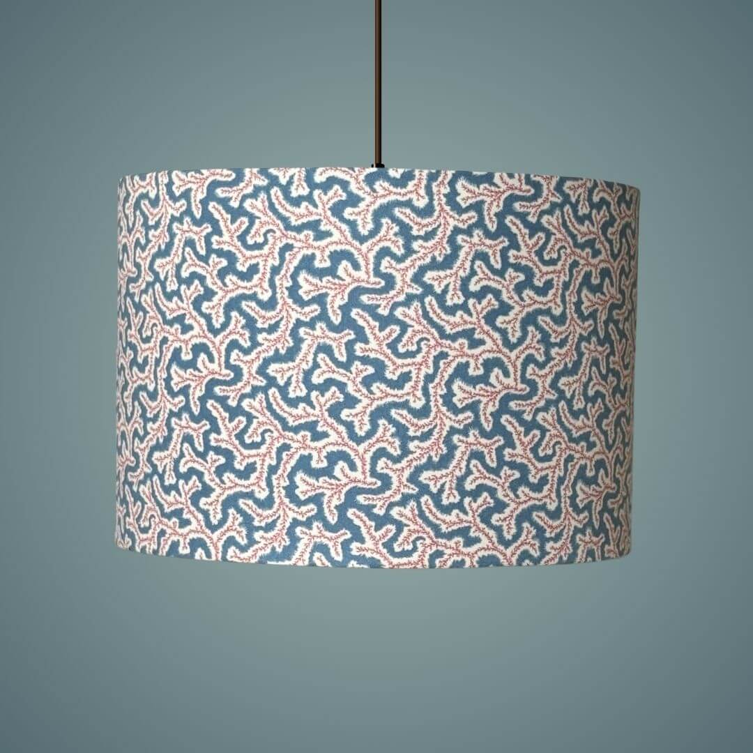 Drum lampshade made with Ian Sanderson Jubilee fabric, a small print design based on a seaweed pattern on a ceiling light