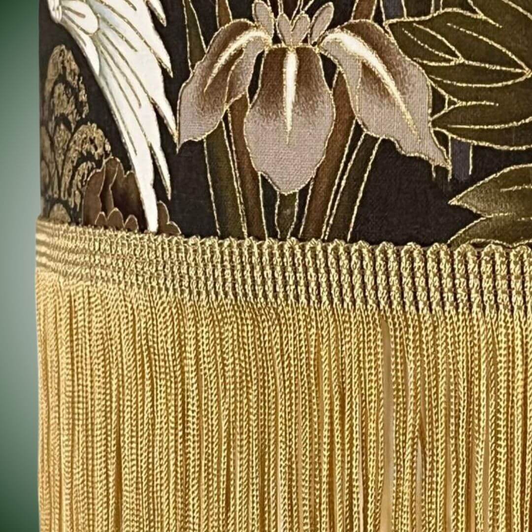 japanese crane lampshade close up of gold fringe