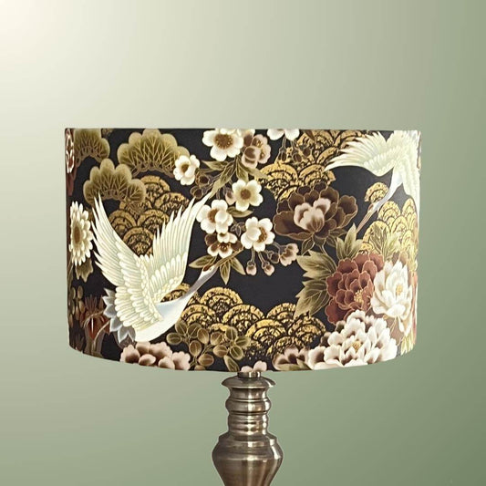 Japanese cranes and florals on a drum lampshade with metalic accents