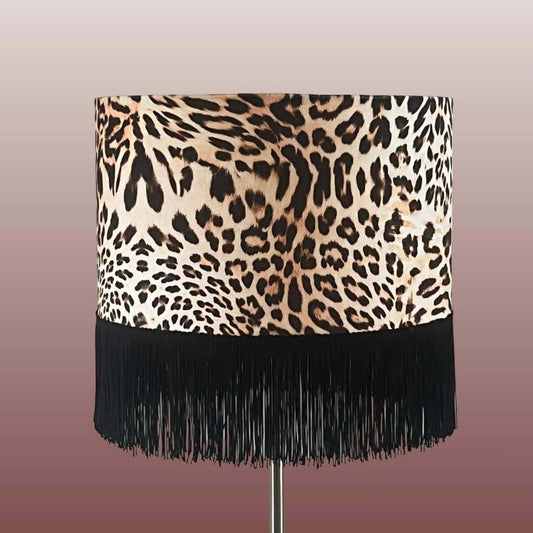 Leopard print velvet lampshade with fringe on lampstand