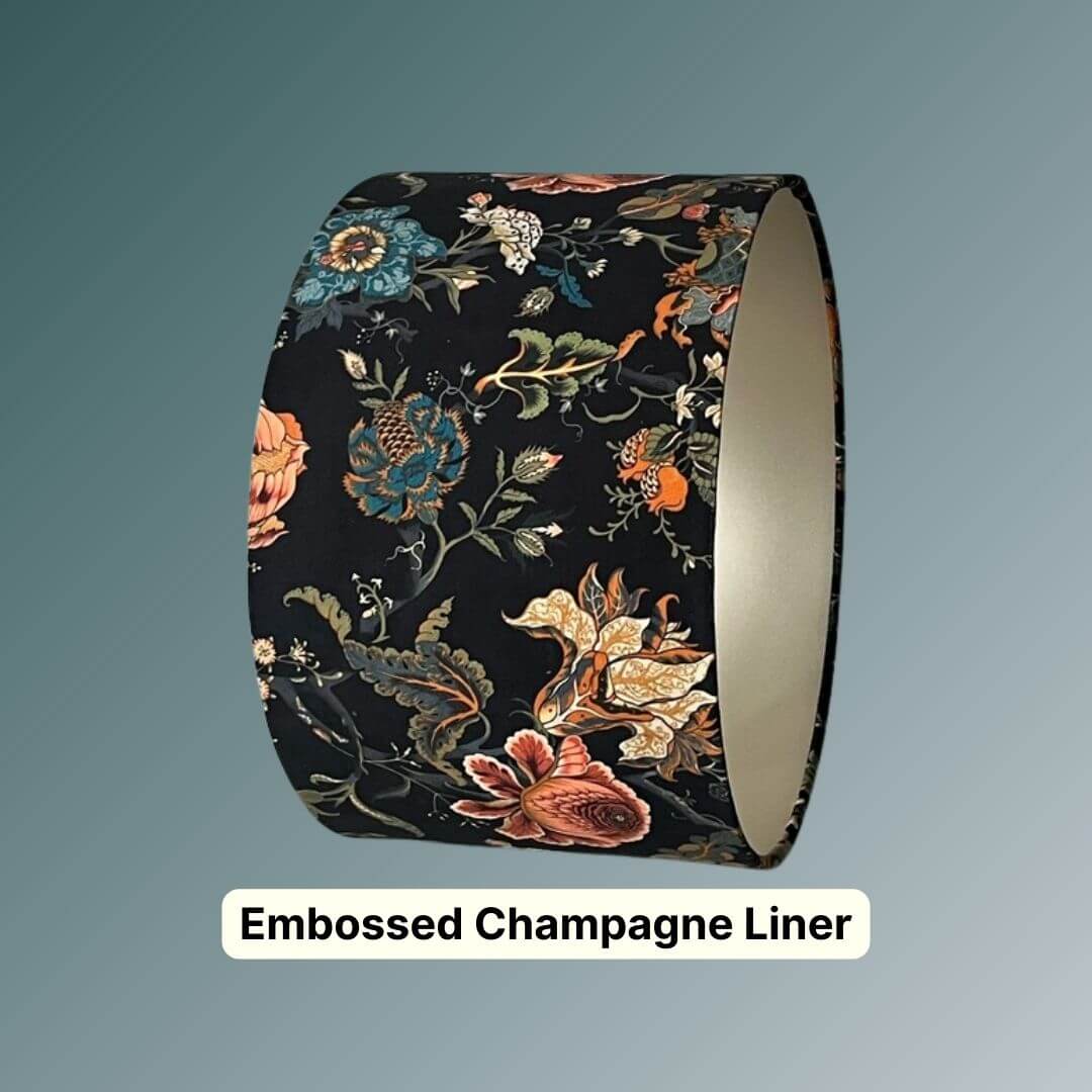 Drum lampshade made from Mallion & Knowles Athena midnight velvet showing metallic champagne liner