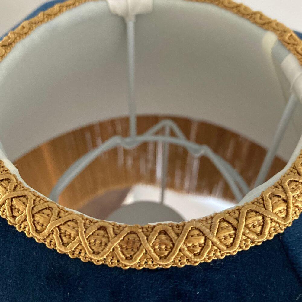 Navy velvet dome parachute vintage style lampshade with deep gold fringe tassels close up view of braid