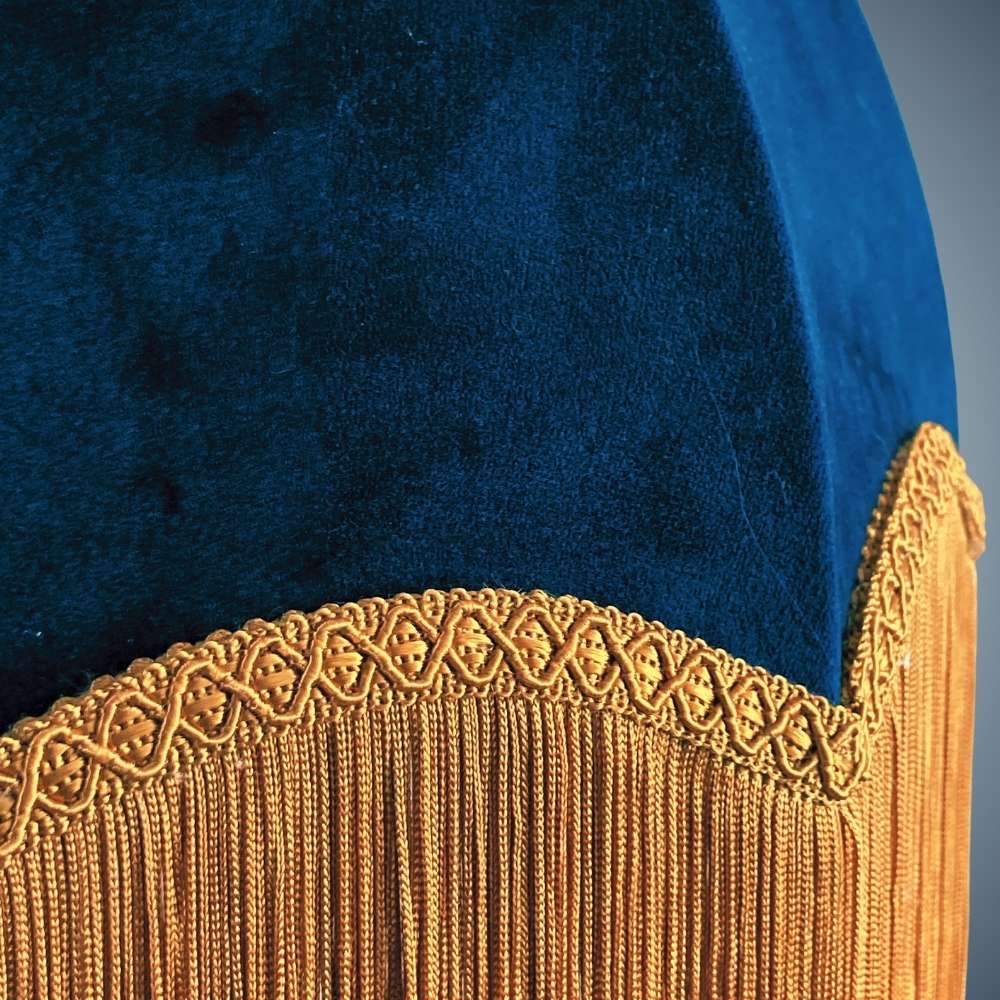 Navy velvet dome parachute vintage style lampshade with deep gold fringe close up