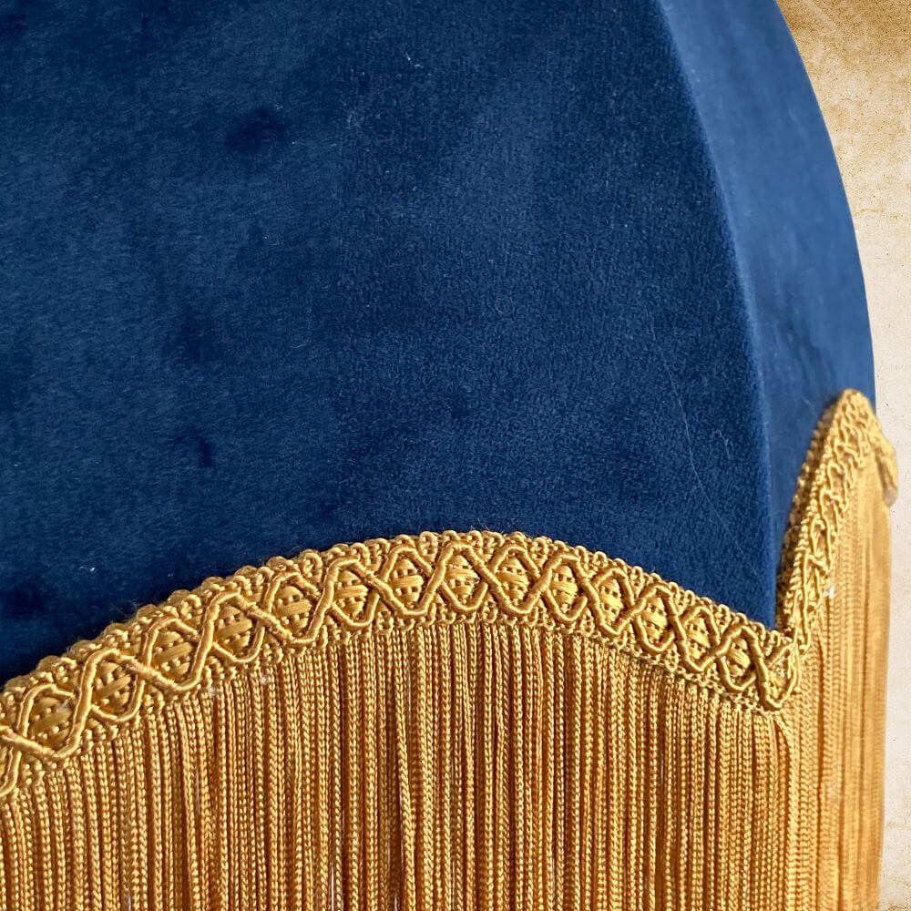 Navy velvet dome parachute vintage style lampshade with deep gold fringe tassels close up