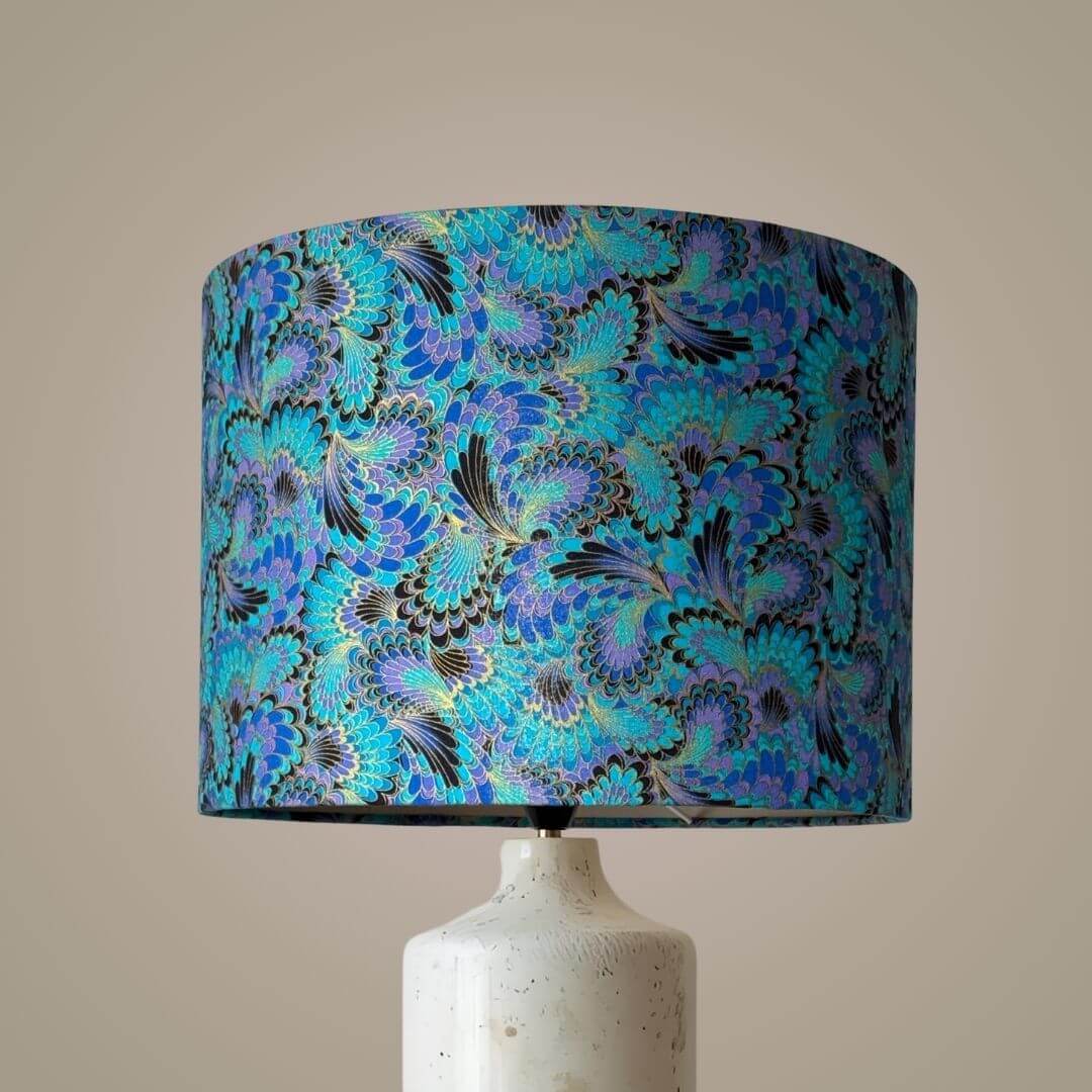 Palazzo Peacock-feather design drum lampshade on  a marble lampbase