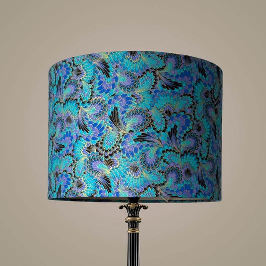 Palazzo Peacock-feather design drum lampshade on an ornate lampbase