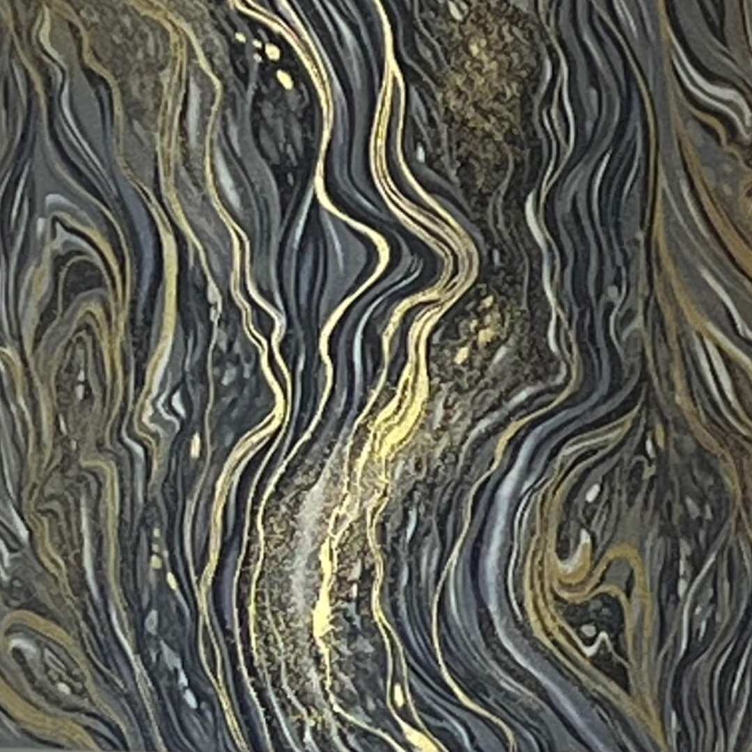 marbled fabric pattern in shades of grey, silver and gold 