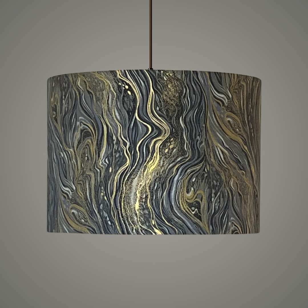 Decorative drum lampshade with a marbled pattern in shades of grey, silver and gold 
