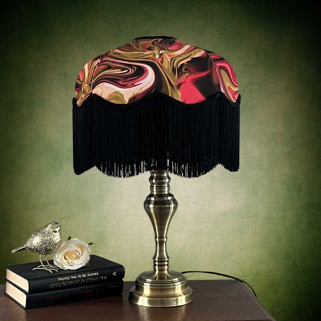 Pink and green marble pattern lampshade with black fringe