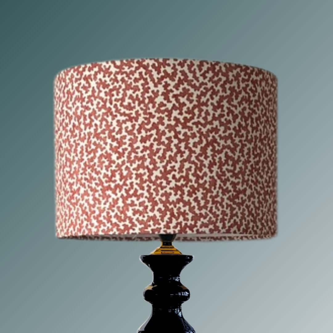 Romo Junie Pimento drum lampshade shown on a bllue lampbase 