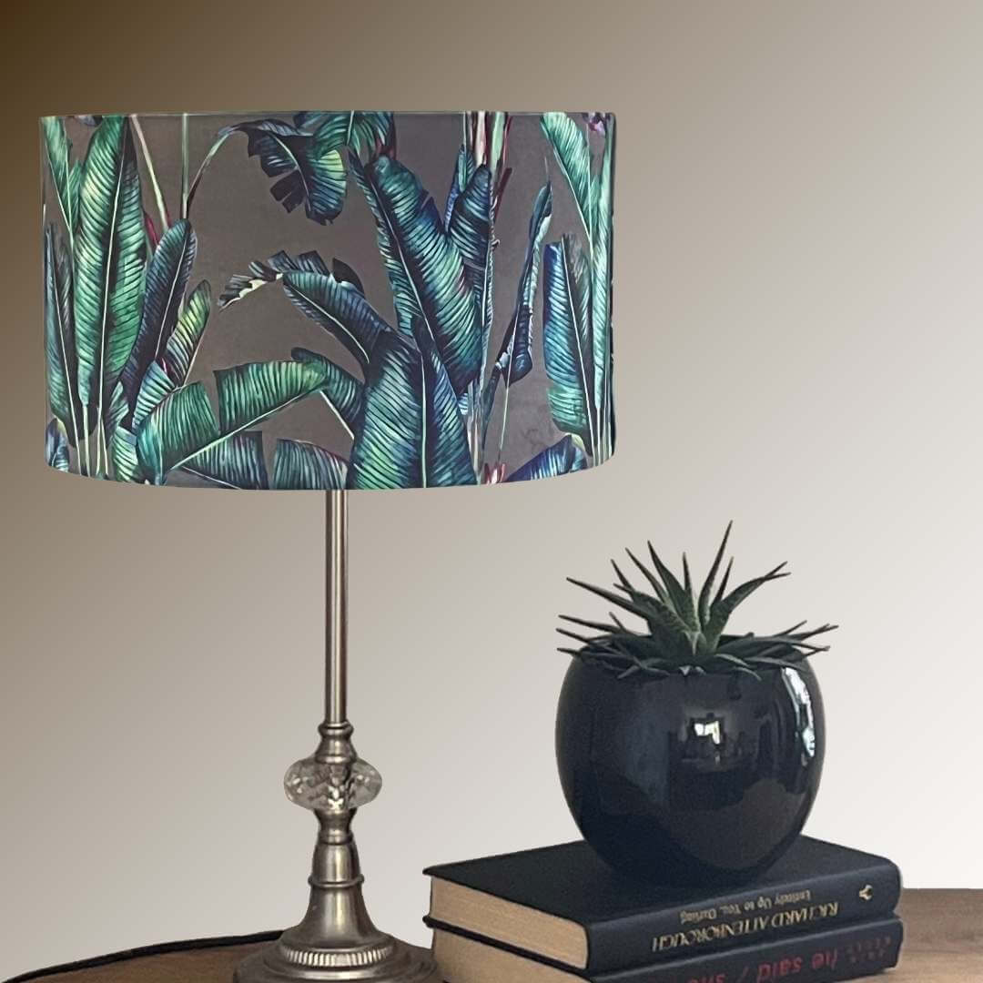 Tropical-palm-leaves-drum-lampshade-on-console