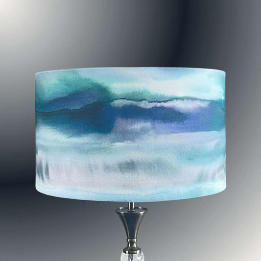 Voyage Maison Fjord Cobalt Drum lampshade on a table lamp