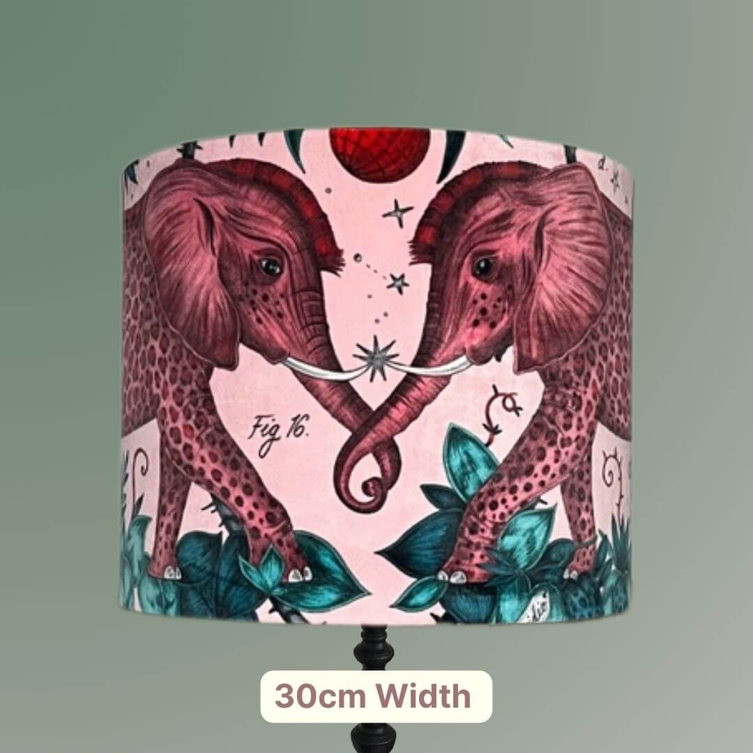 Emma Shipley zambezi design Lampshade with elephants and jungle foliage on a pink velvet background