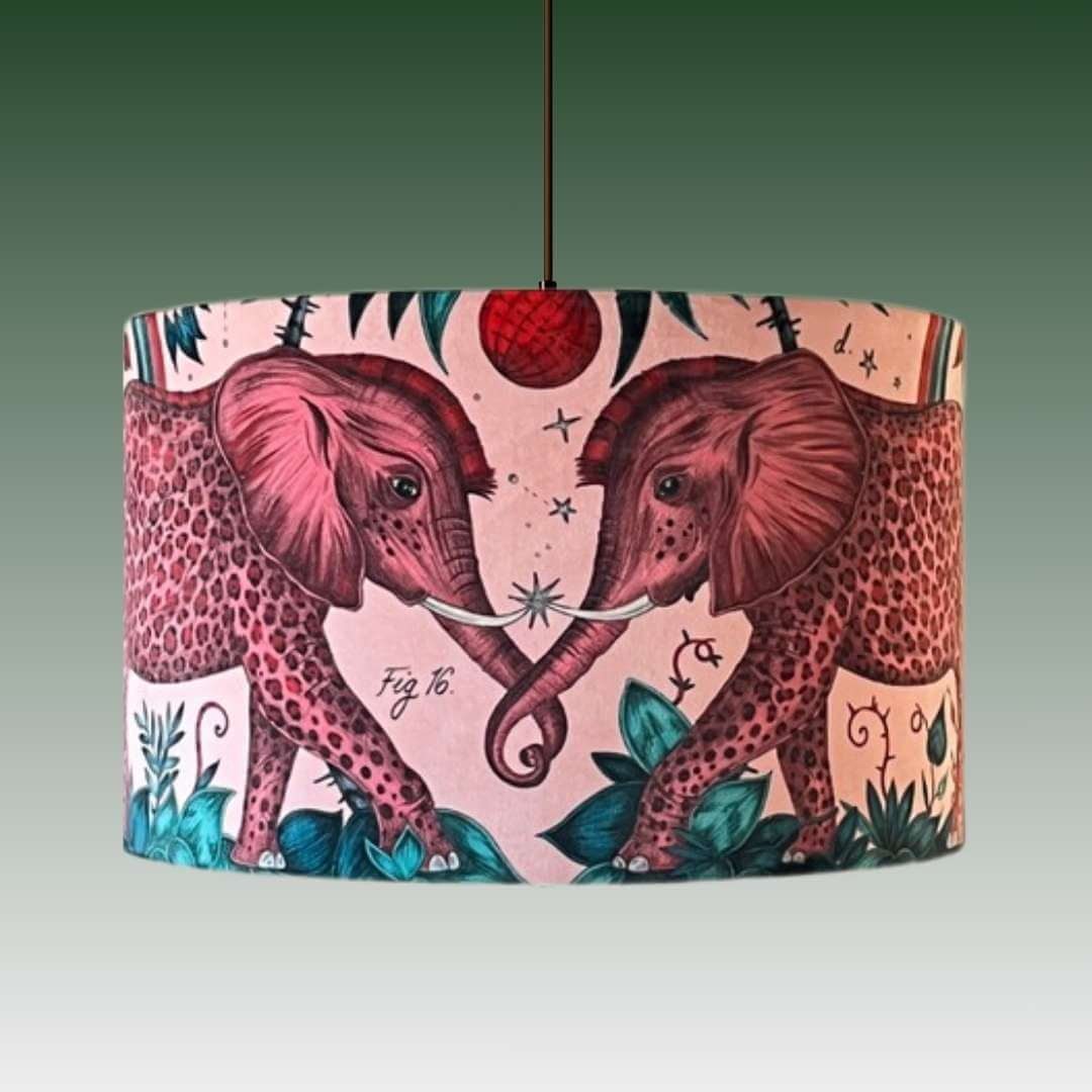 Emma Shipley Zambezi design Lampshade with elephants and jungle foliage on a pink velvet background