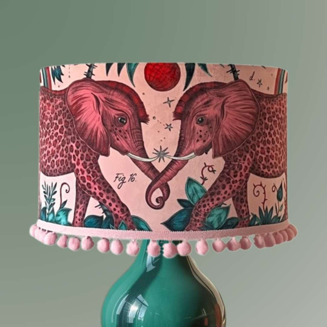 Emma Shipley zambezi design Lampshade with elephants and jungle foliage on a pink velvet background 