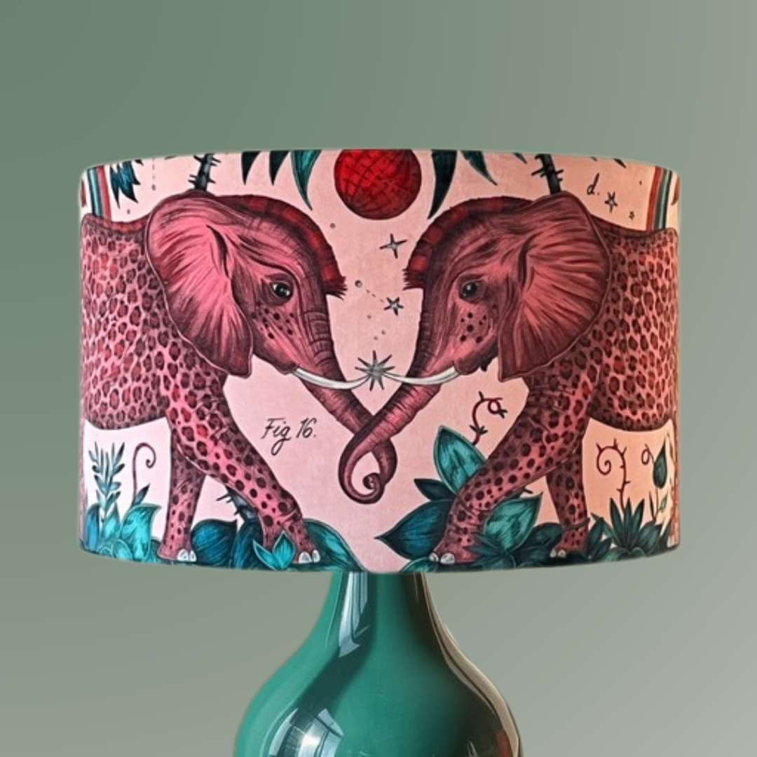 Emma Shipley zambezi design Lampshade with elephants and jungle foliage on a pink velvet background