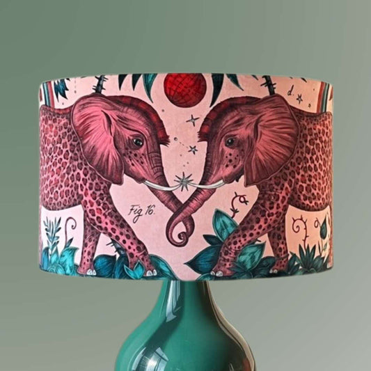 Emma Shipley zambezi design Lampshade with elephants and jungle foliage on a pink velvet background
