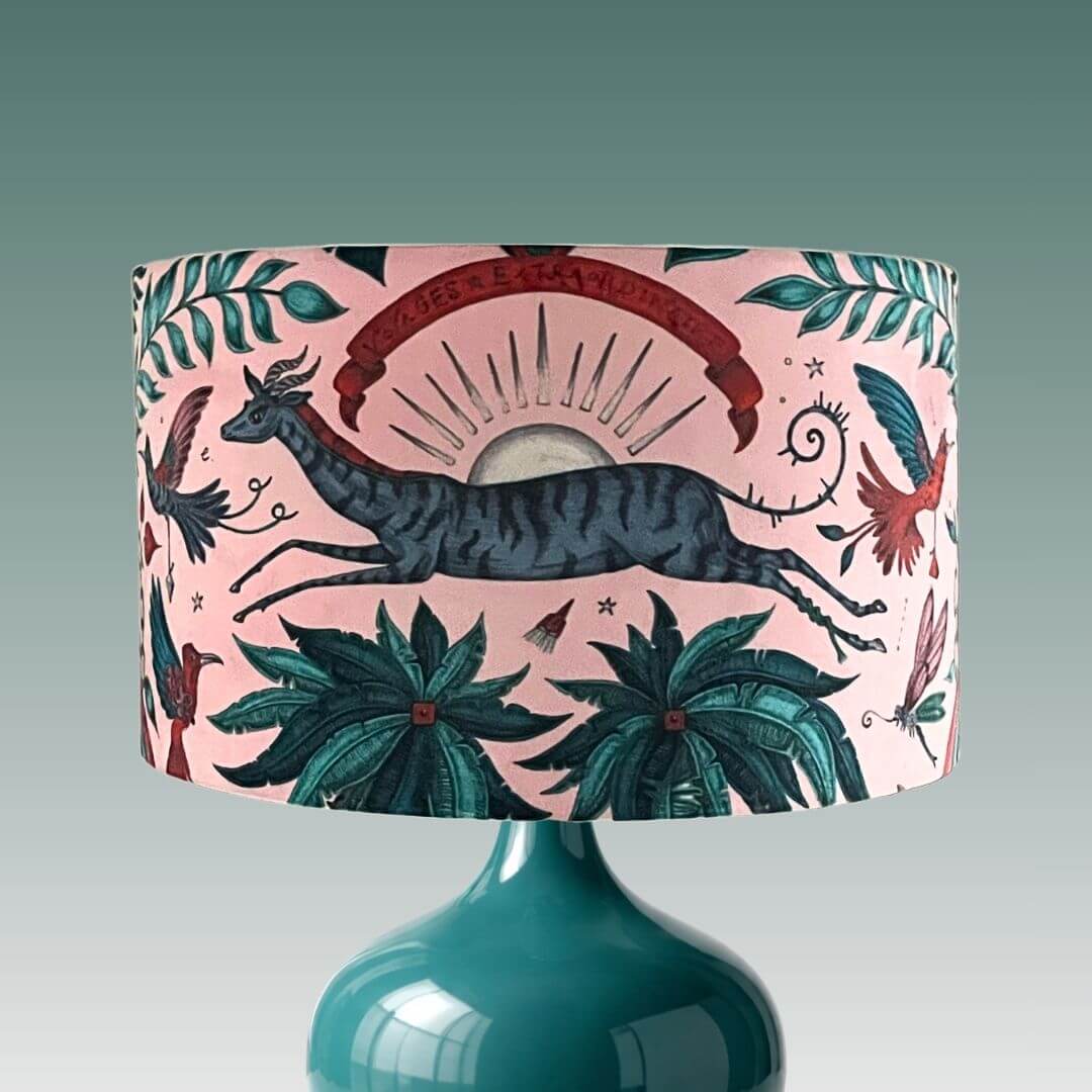 Emma J Shipley zambezi gazelle pink velvet lampshade on a teal lamp base 